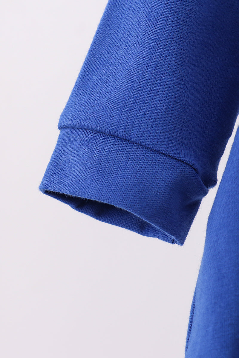 Close-up of a blue sleeve on a light gray background