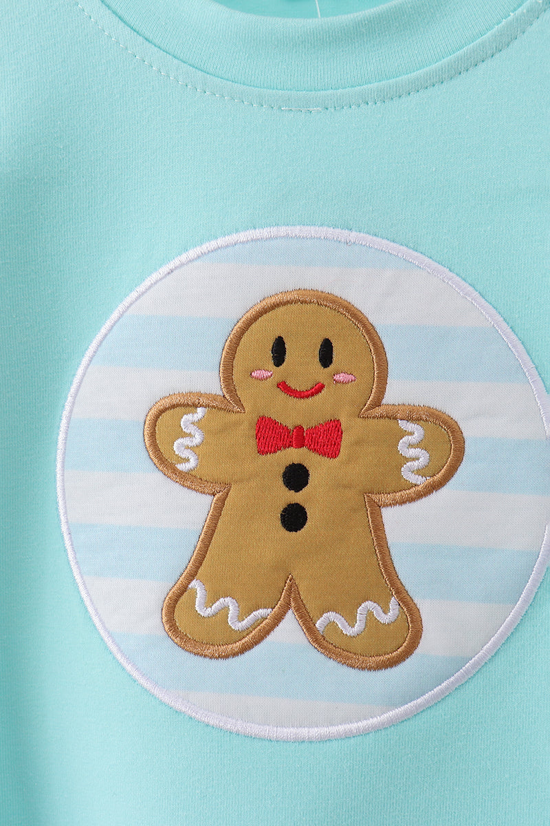 Gingerbread man patch on a light blue background