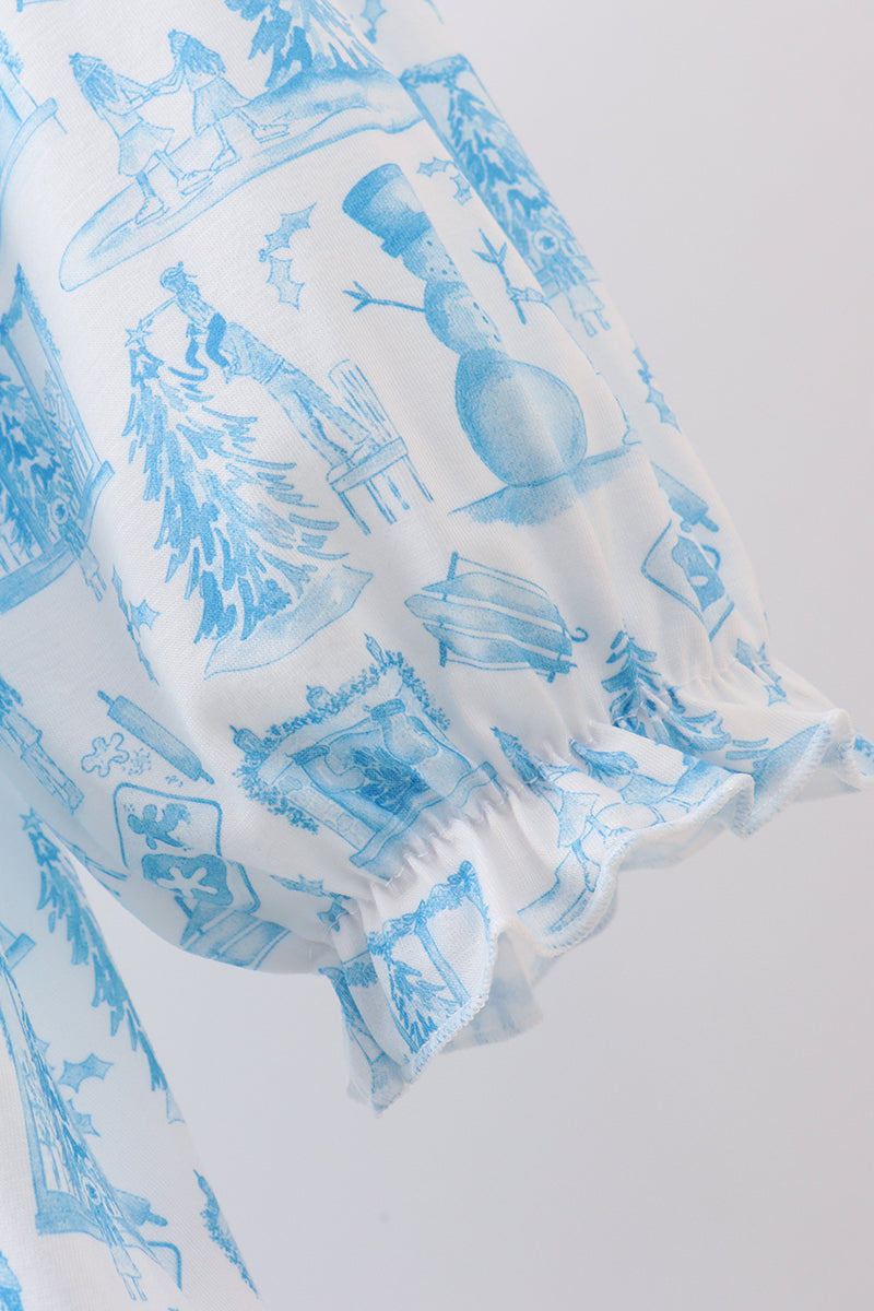 Blue snowman pattern on a white pillowcase