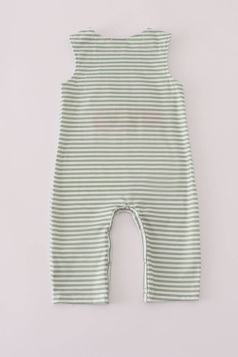 Green and white striped baby romper on a light gray background