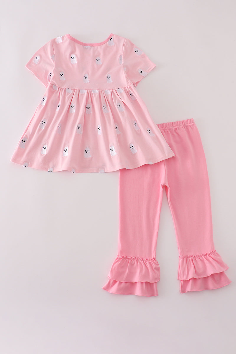 Pink children's outfit with top and leggings on a light gray background