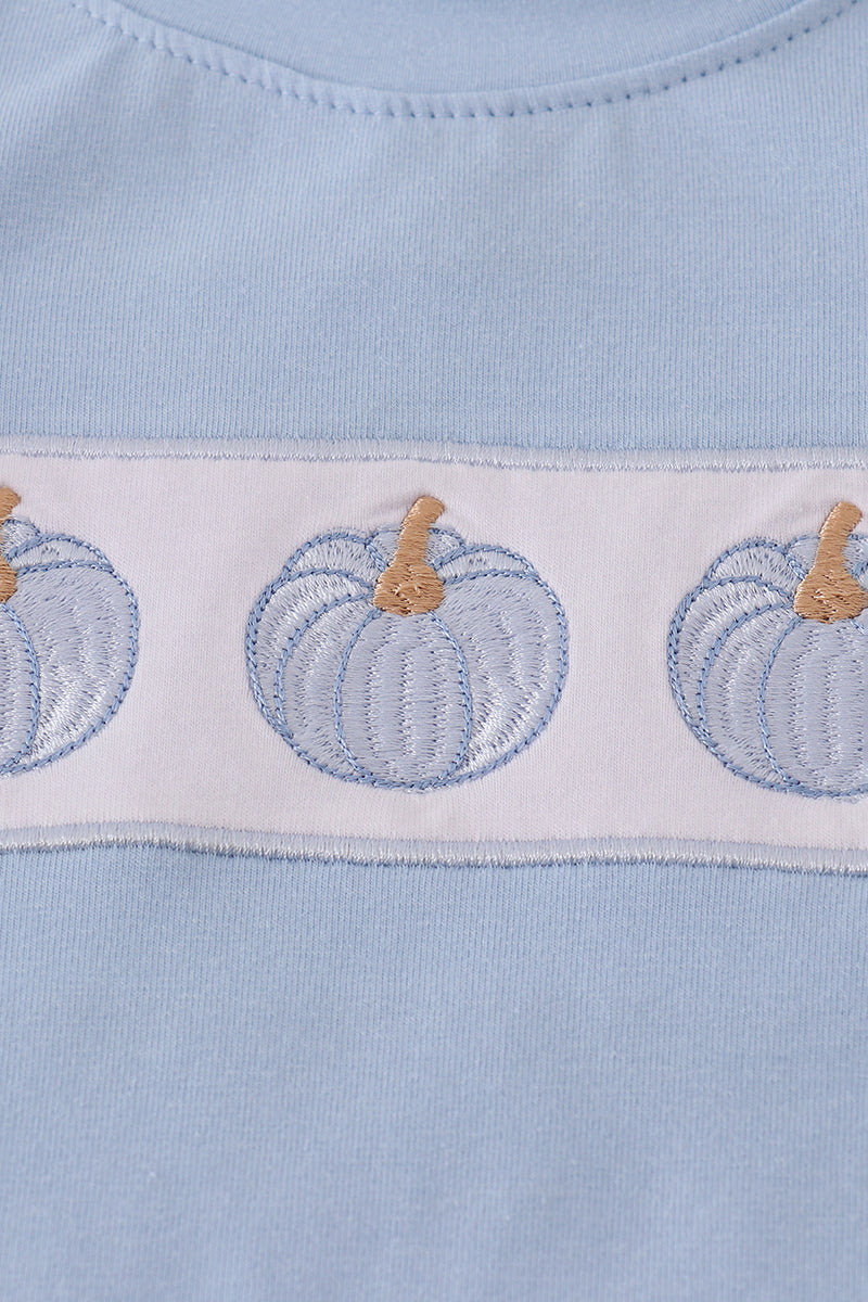 Light blue fabric with embroidered pumpkins