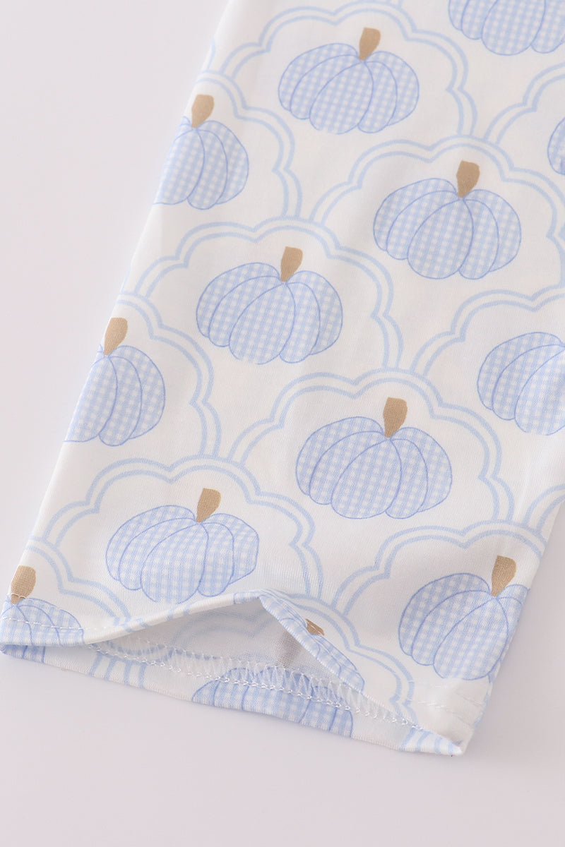 Fabric with blue pumpkin pattern on a white background