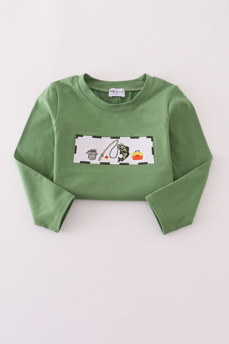 Green long-sleeve shirt with a graphic design on a white background