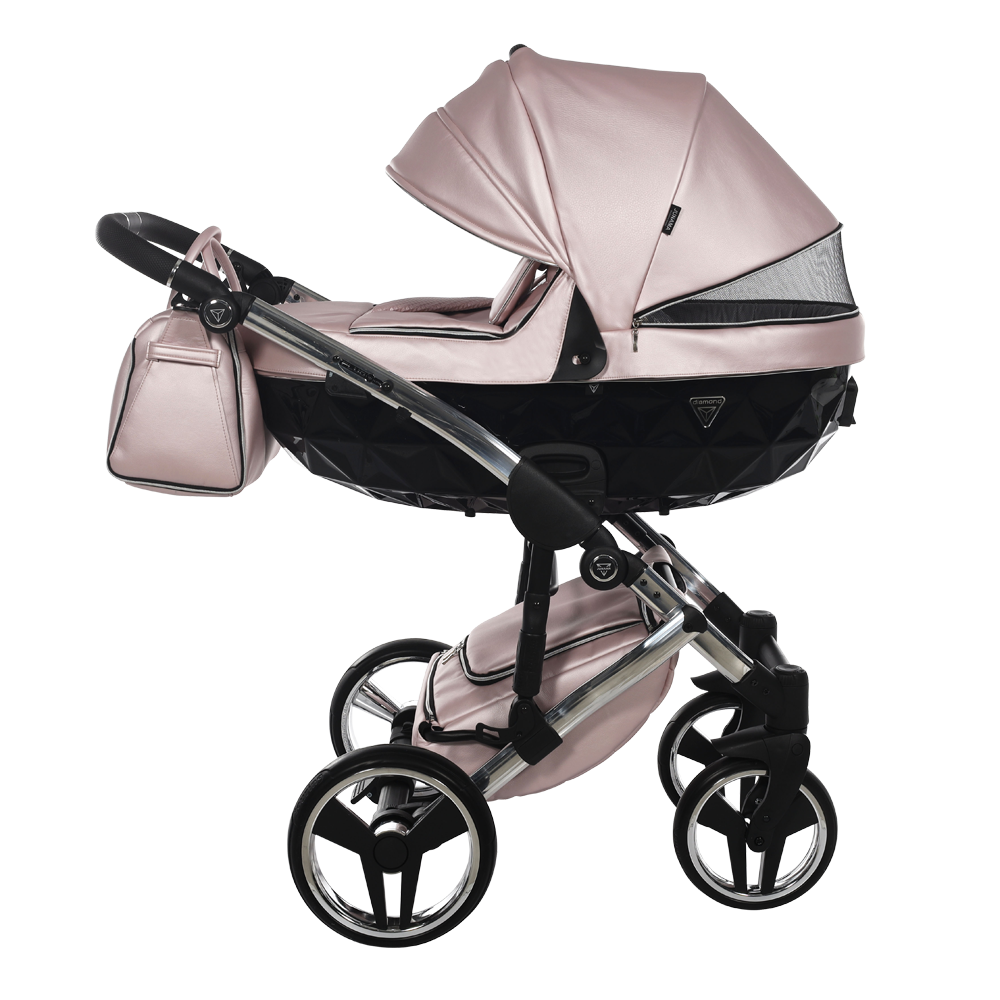 Pink baby stroller with matching bag on a white background