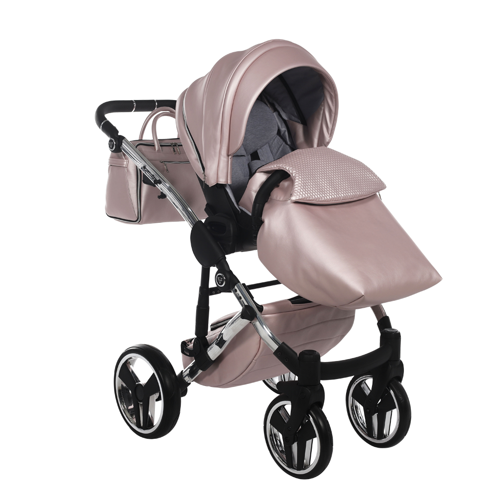 Pink baby stroller with canopy on a white background