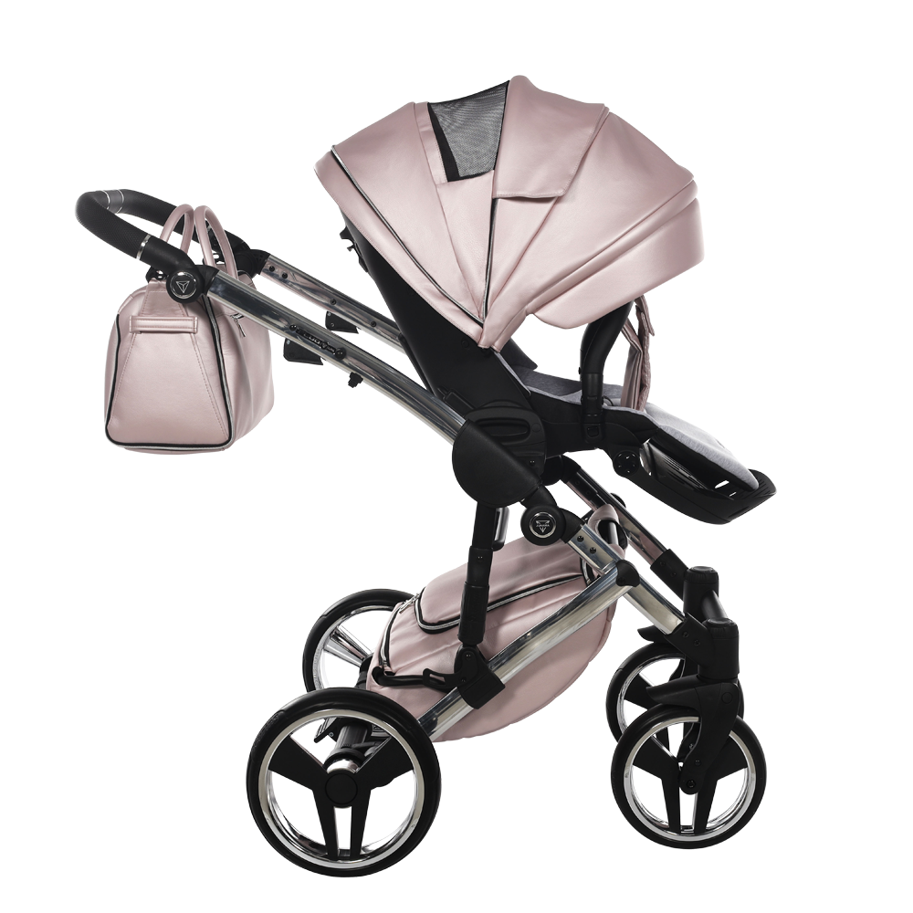 Pink baby stroller with matching bag on a white background