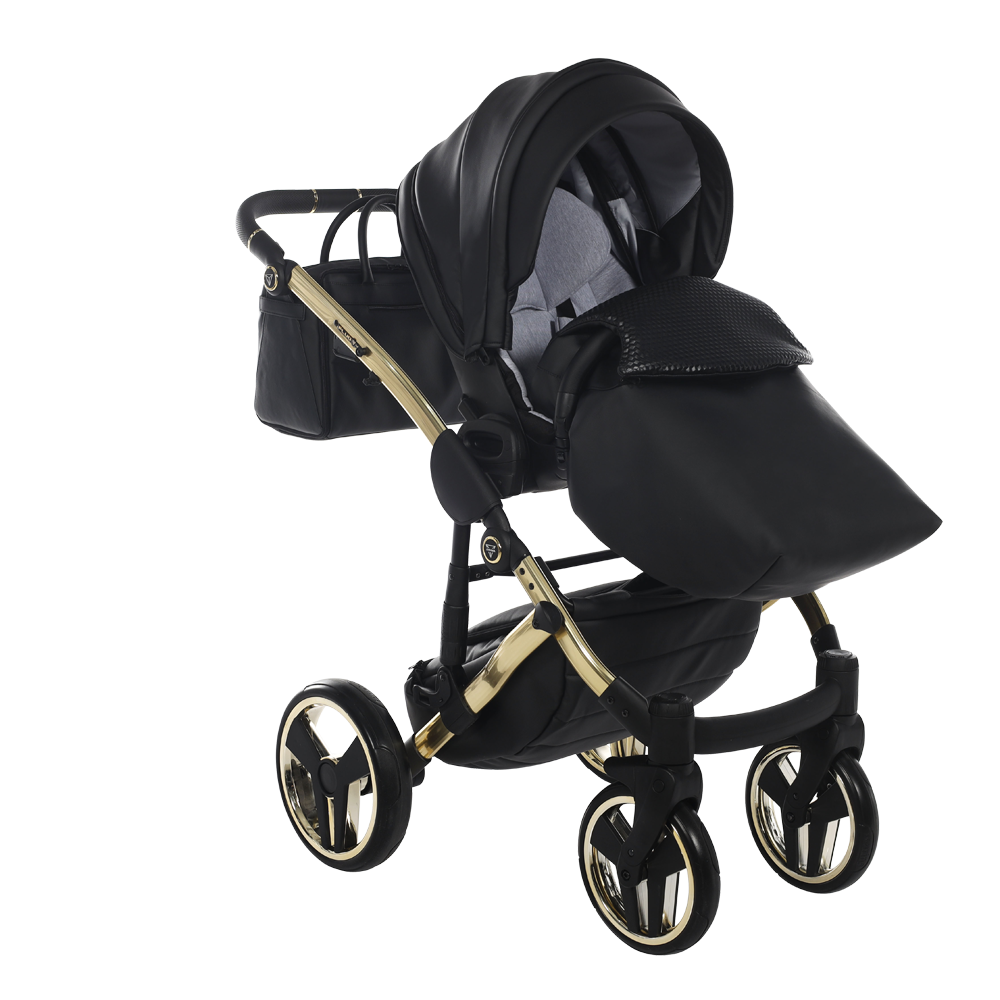 Black and gold stroller on a white background