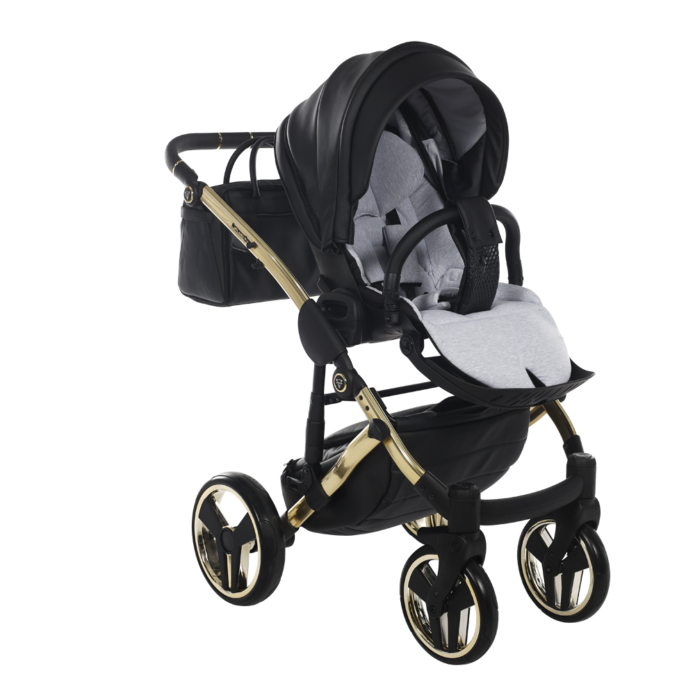 Black and gold baby stroller with a white seat on a white background