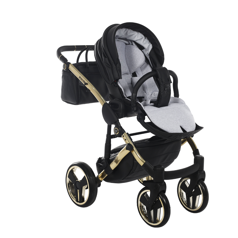 Black and gold stroller with a white cushion on a white background