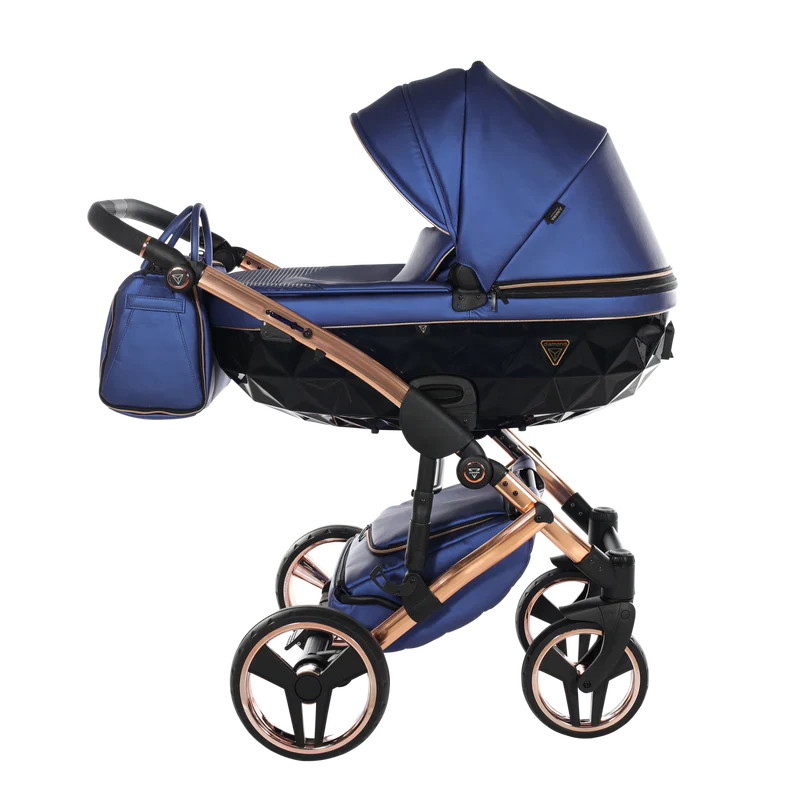 Blue and rose gold baby stroller with matching bag on a white background