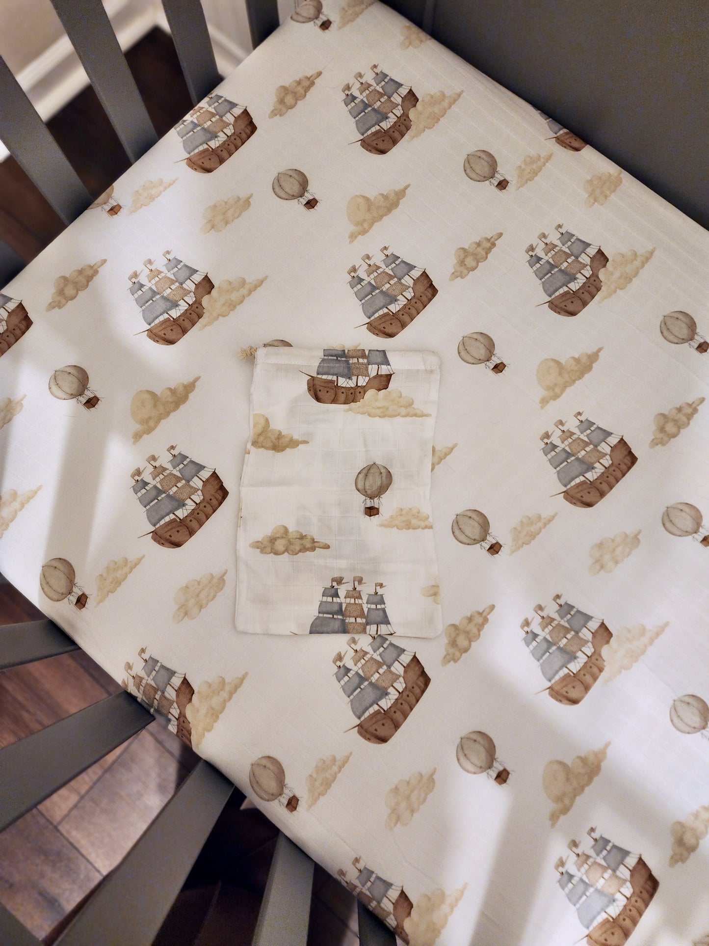 Crib sheet with ship pattern on a crib