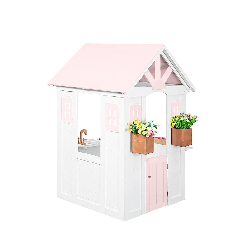 Children's playhouse with pink roof and white body, featuring a sink and flower pots on a white background.