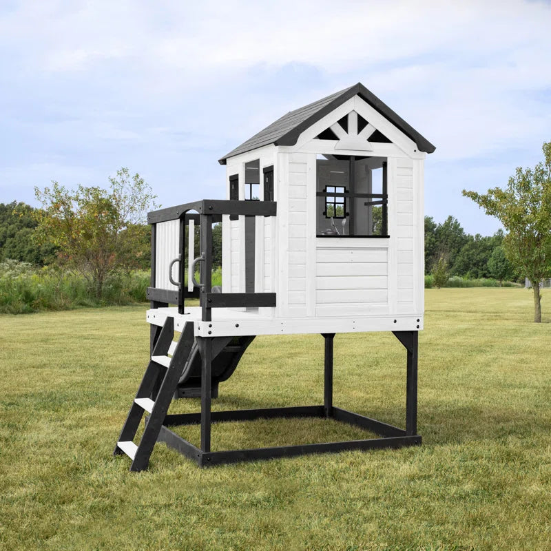 Sweetwater Heights White Cedar Wooden Elevated Kids Playhouse with Wave Slide, Play Kitchen, and Deck