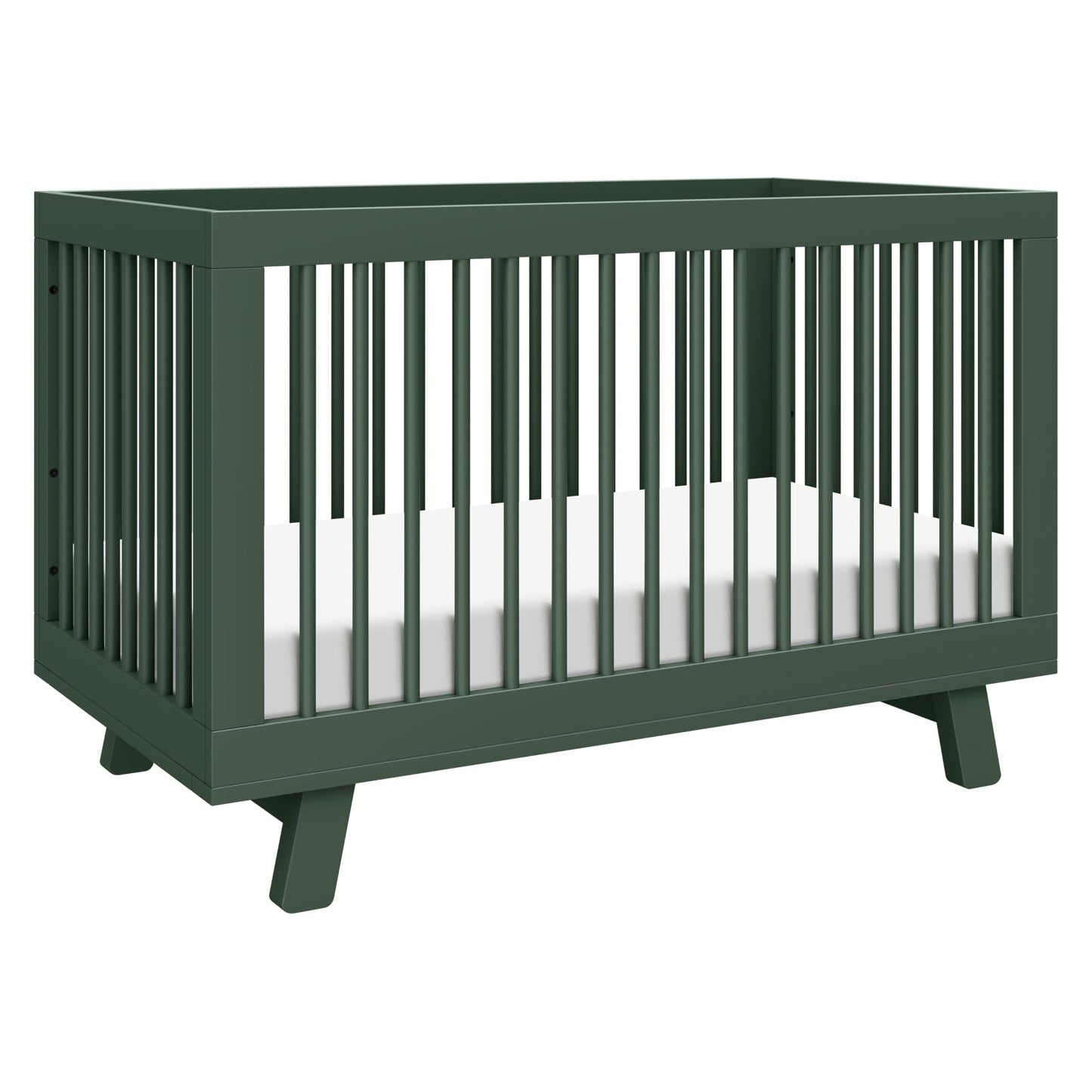Green crib with white mattress on a white background