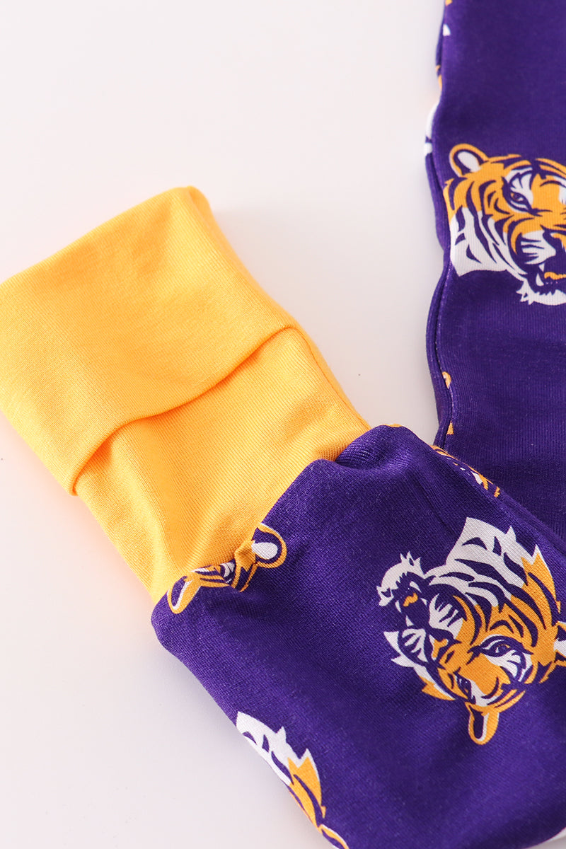 Purple and gold fabric with tiger logo on a white background