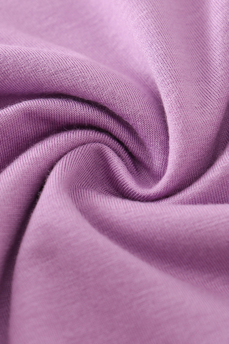 Close-up of purple fabric with a swirl pattern