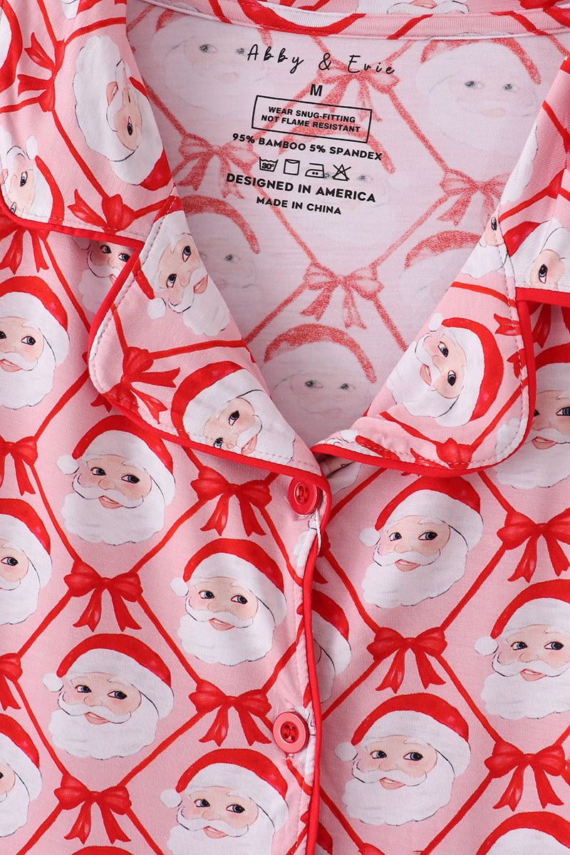 Patterned fabric with Santa Claus design and brand label visible