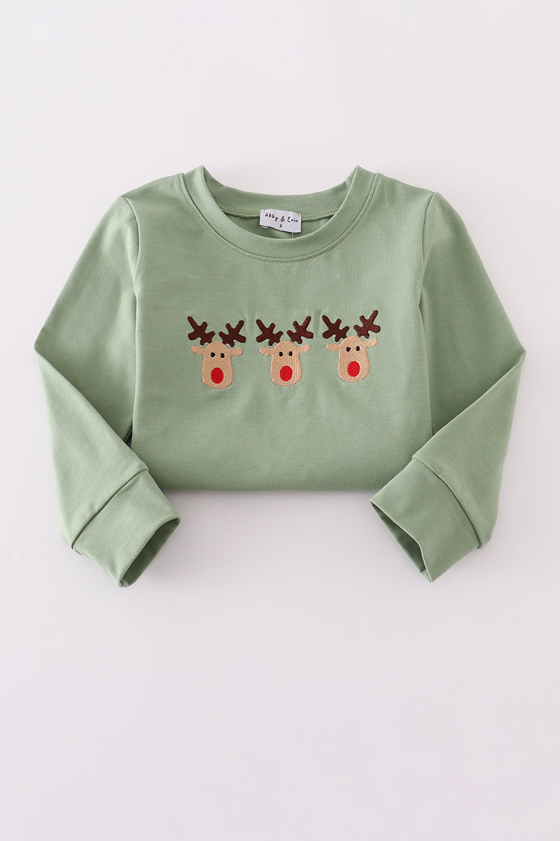 Green sweatshirt with reindeer design on a white background