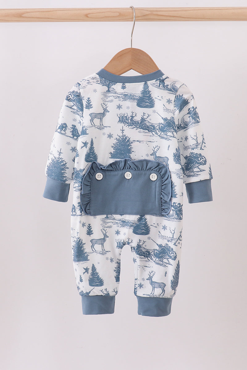 Children's pajama set with blue and white pattern on a hanger against a light background