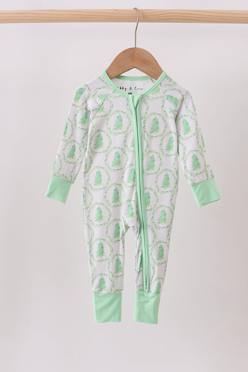 Green and white baby onesie with cactus pattern on a hanger against a white background