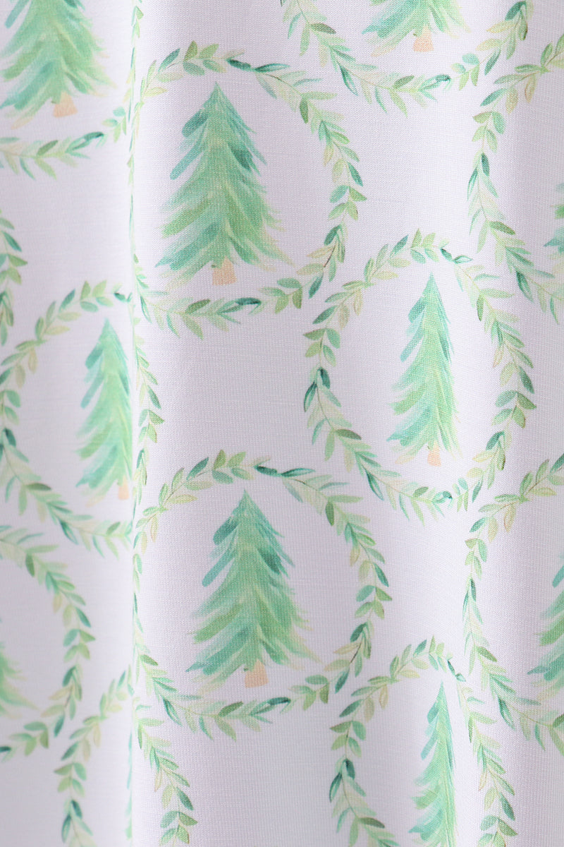 Pattern of green trees and leaves on a white background