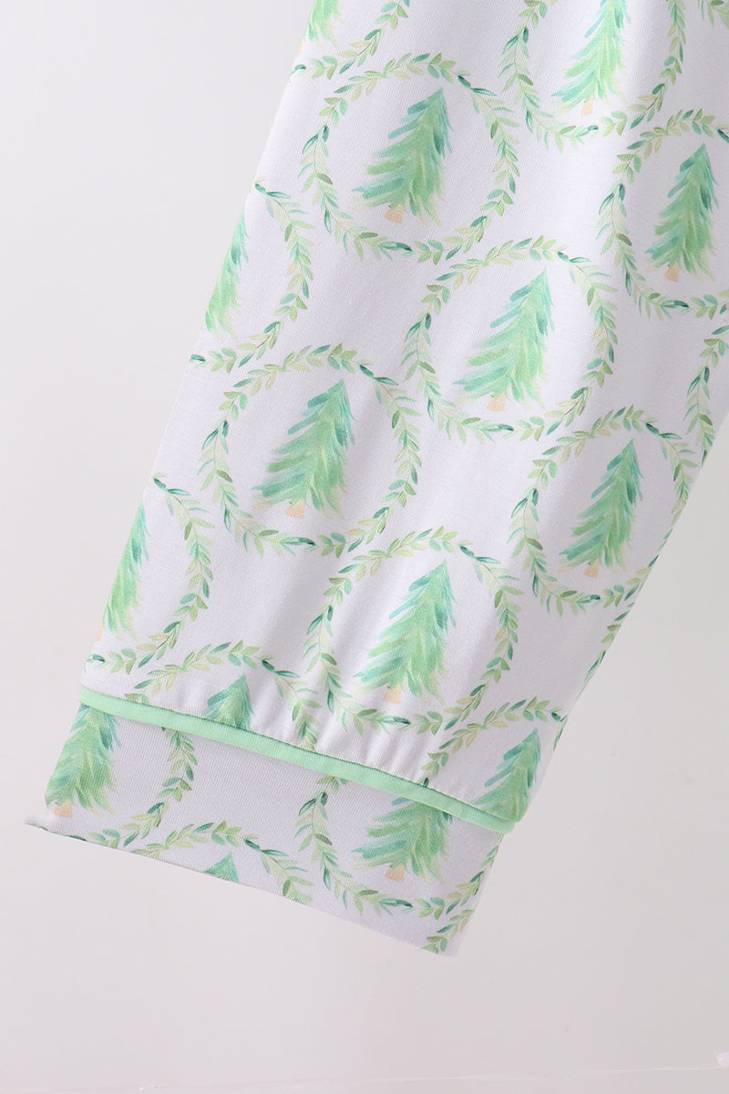 Green leaf patterned fabric on a white background