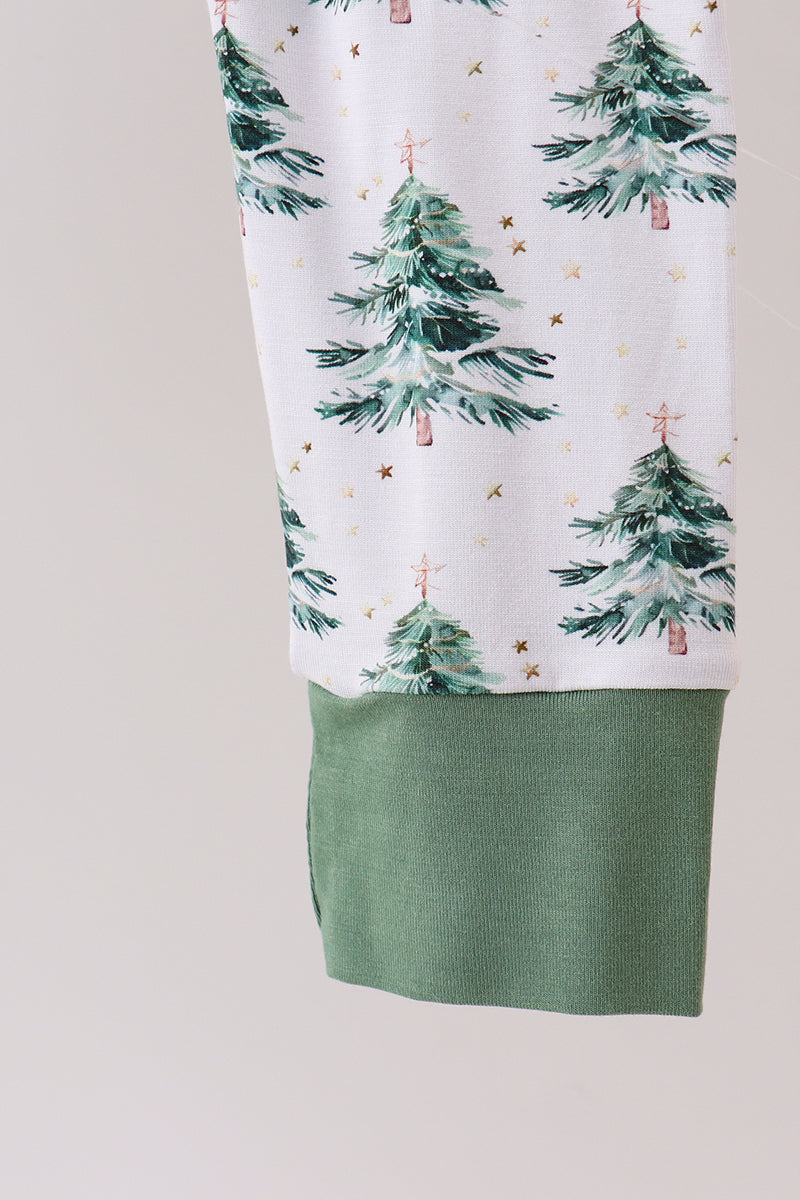 Green skirt with a white top featuring Christmas tree pattern on a plain background