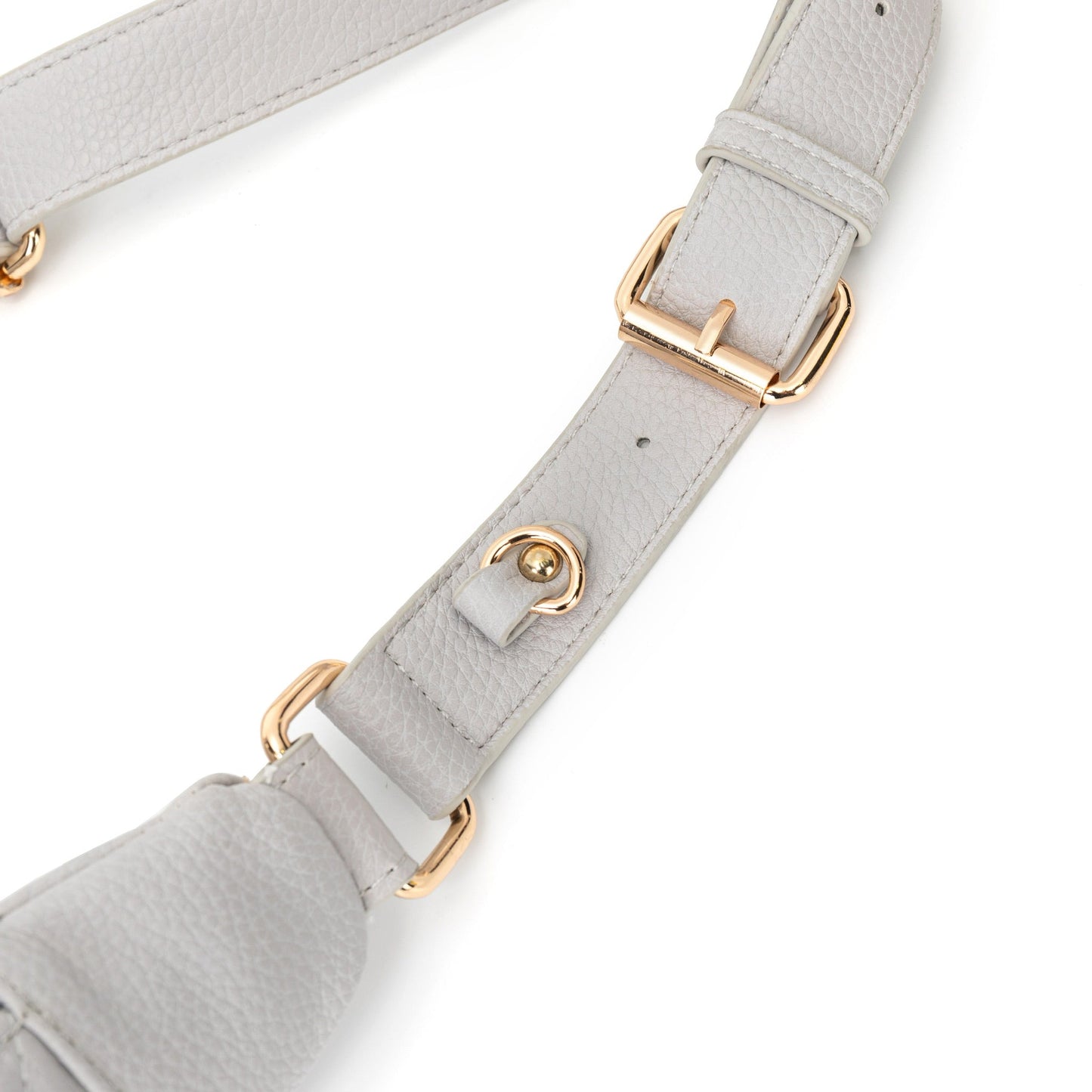 Gray strap with gold hardware on a white background