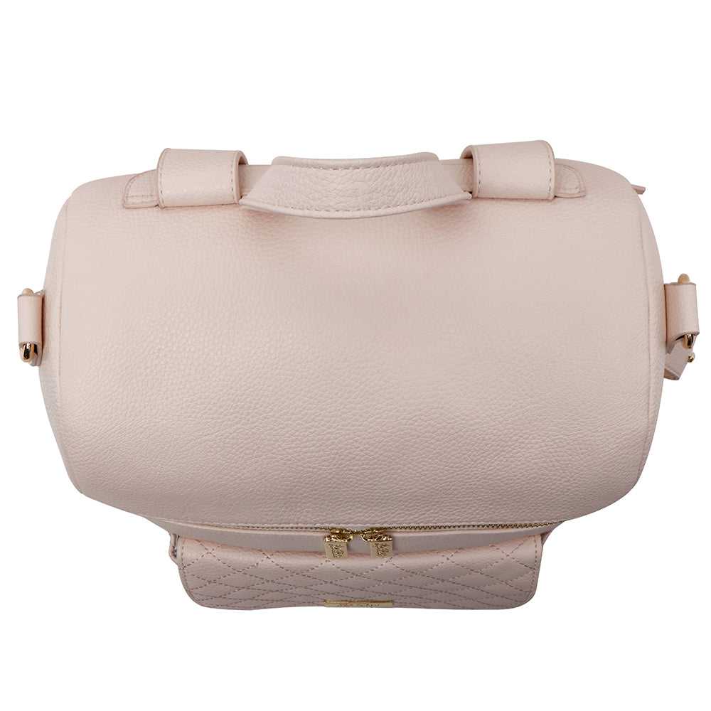Pink handbag with bow details on a white background