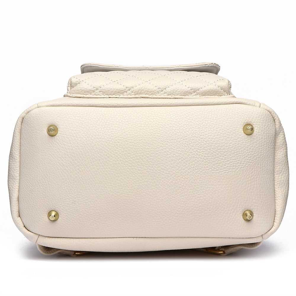White handbag with gold accents on a white background
