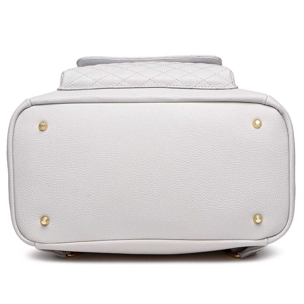 Light gray handbag with gold accents on a white background