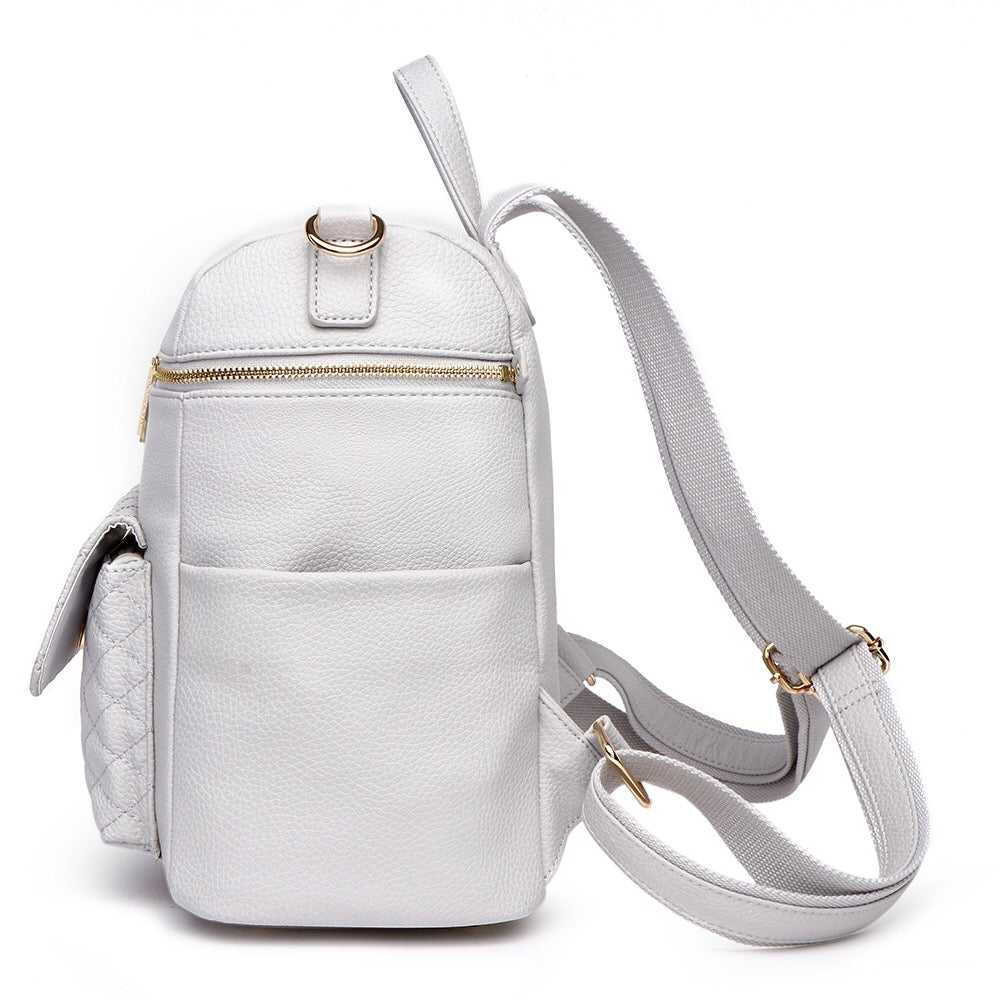White backpack with gold zippers on a white background