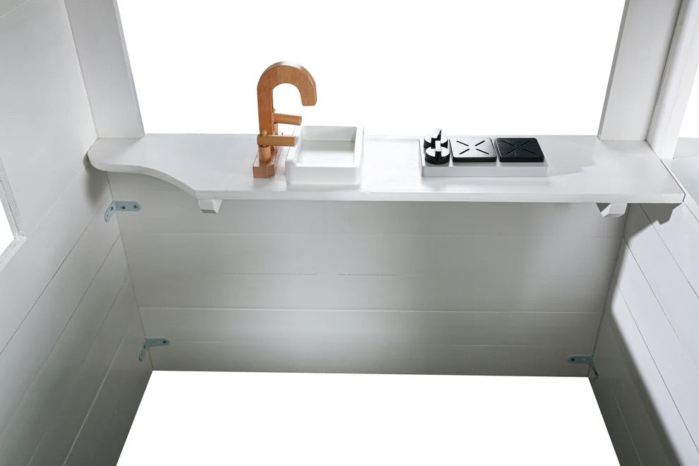 White folding desk with a small shelf on top, featuring decorative items.