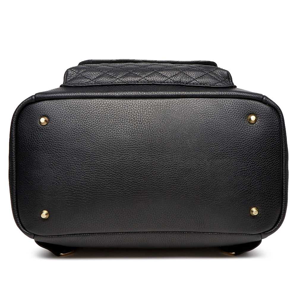 Black leather bag with gold studs on a white background