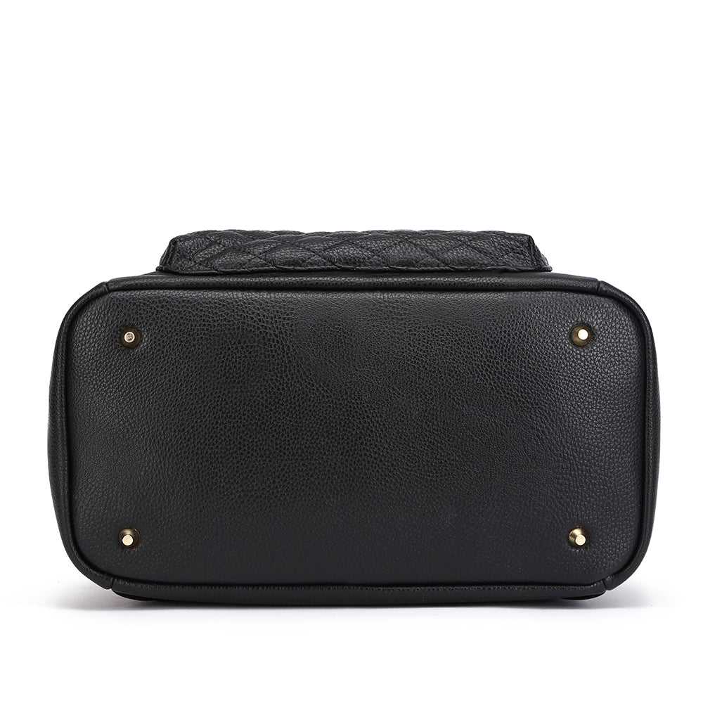 Black leather bag with gold studs on a white background
