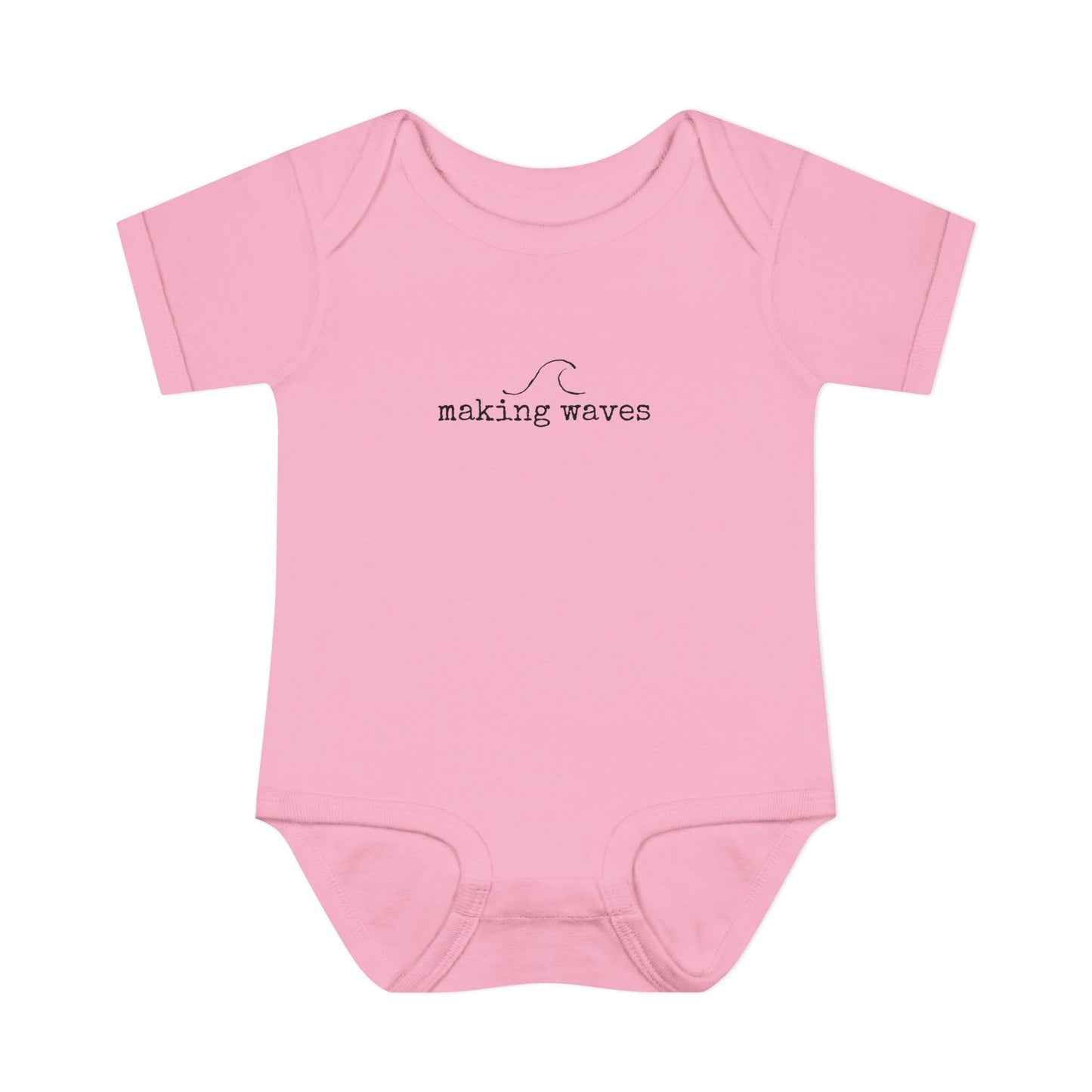 Pink baby onesie with 'making waves' text on a white background