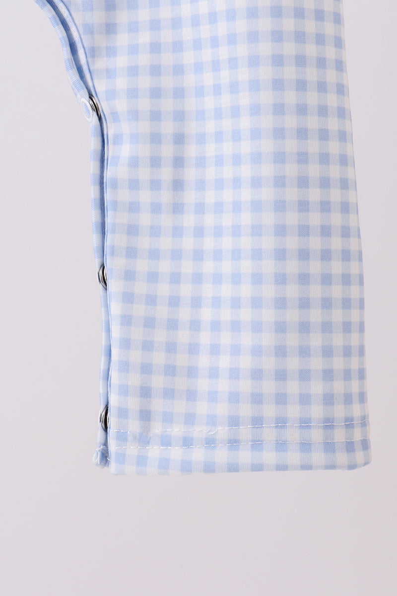 Light blue and white checkered fabric on a light gray background