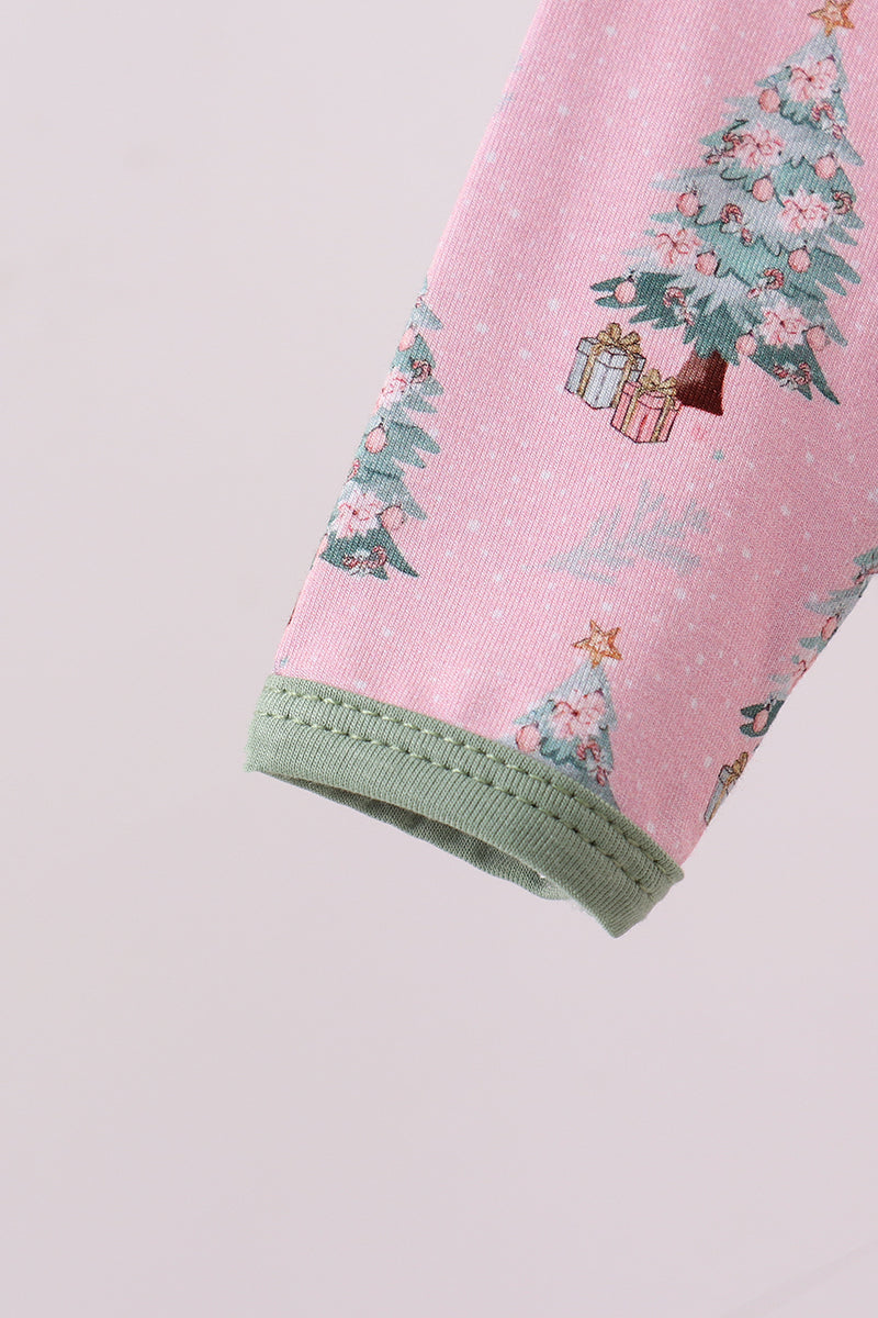 Pink fabric with Christmas tree and gift design on a light gray background