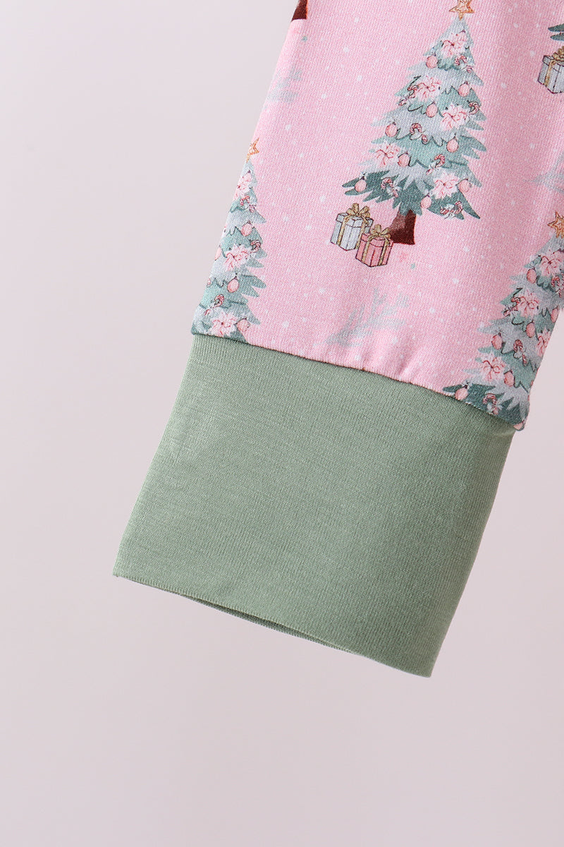 Pink fabric with Christmas tree and gift design on a light gray background