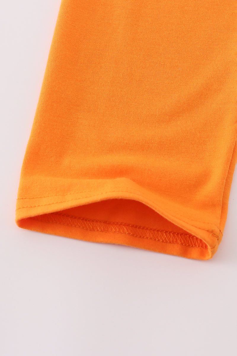 Close-up of an orange fabric on a white background