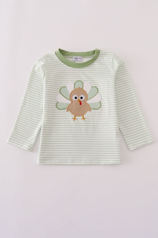 Green and white striped long-sleeve shirt with a turkey applique on a light gray background