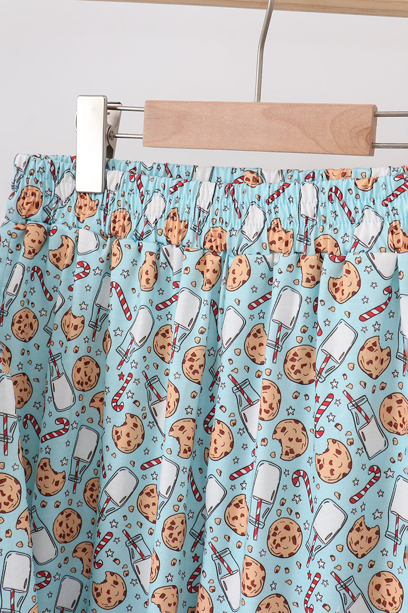 Skirt with cookie and ice cream pattern on a hanger against a light background