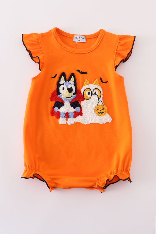 Orange baby romper with Halloween-themed design on a white background