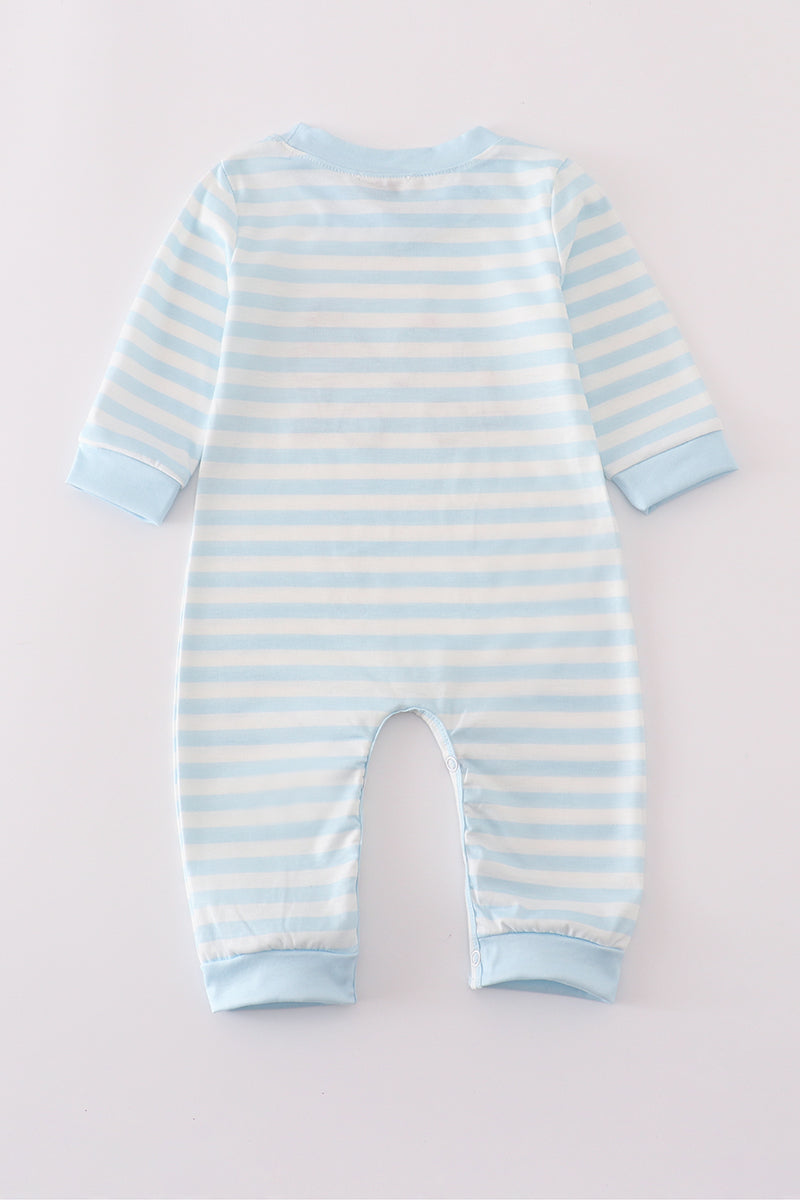 Blue and white striped baby onesie on a light gray background