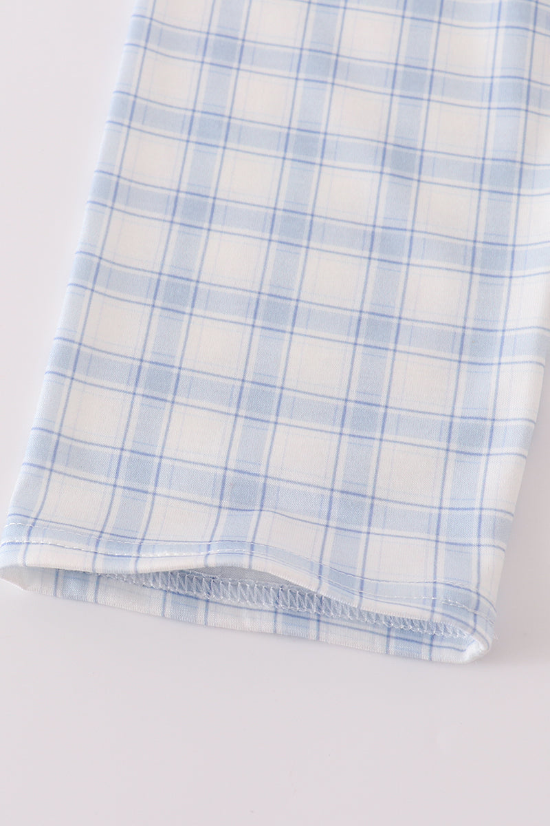 Blue and white checkered fabric on a white background