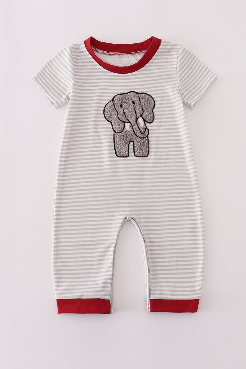 Striped baby romper with elephant design on a white background