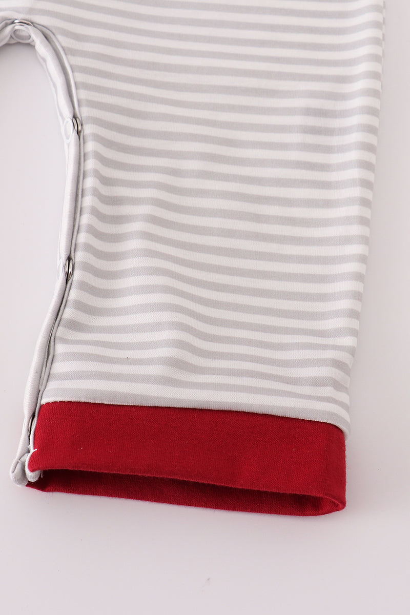 Striped fabric with a red hem on a white background