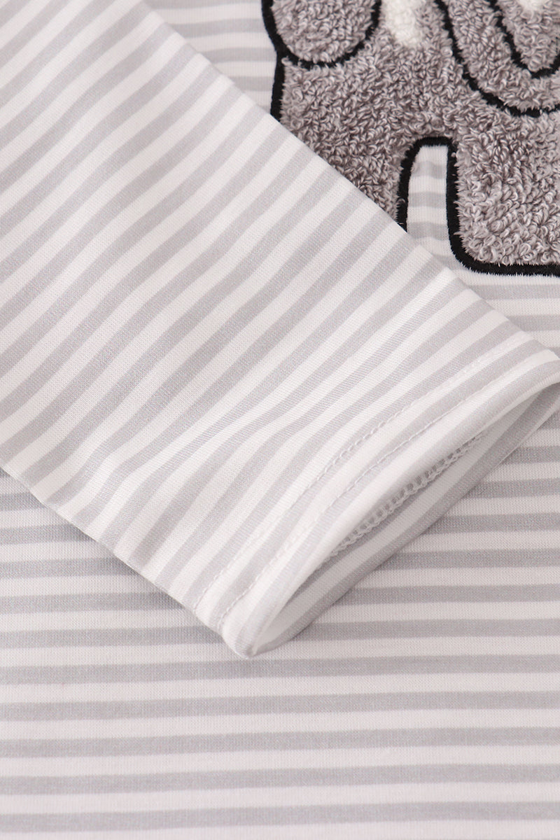 Gray and white striped fabric on a matching background