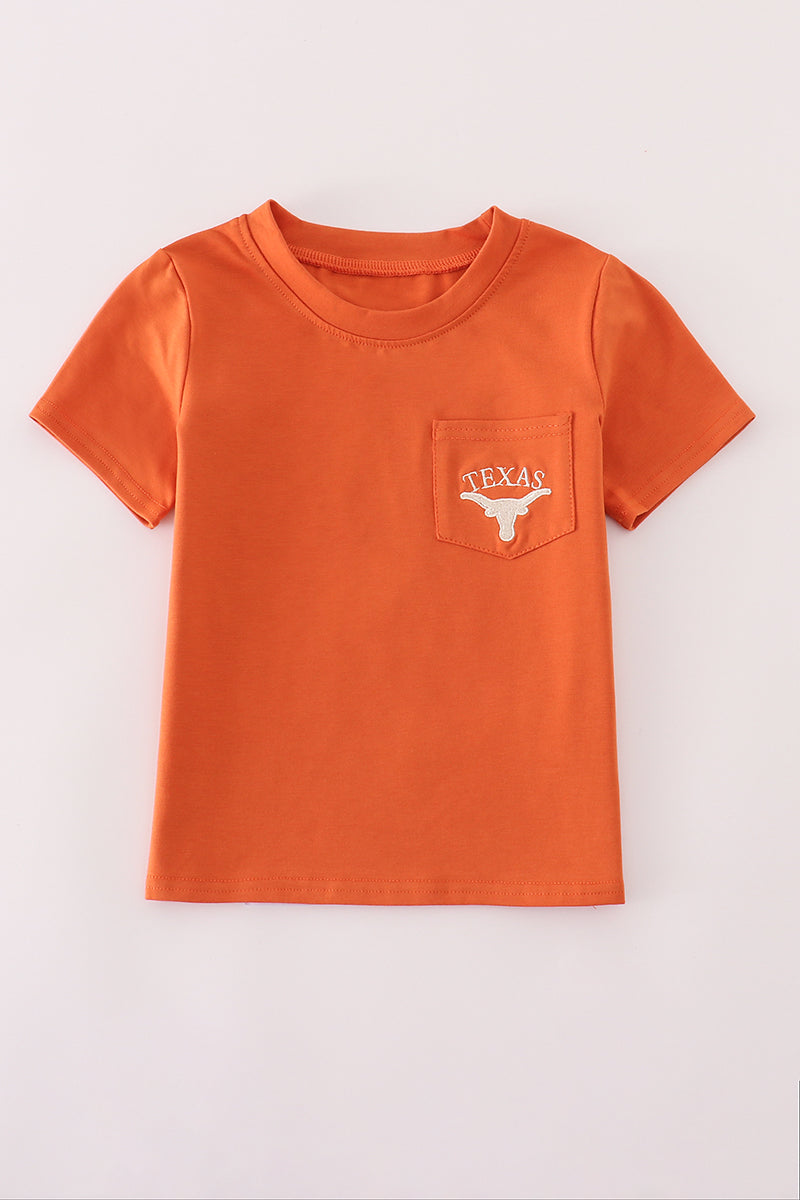 Orange t-shirt with a pocket and 'Texas' logo on a white background